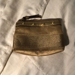 Gold coach coin purse